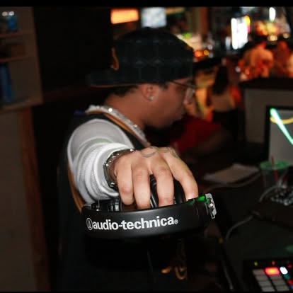 DJ Endy cueing with Audio-Technica headphones