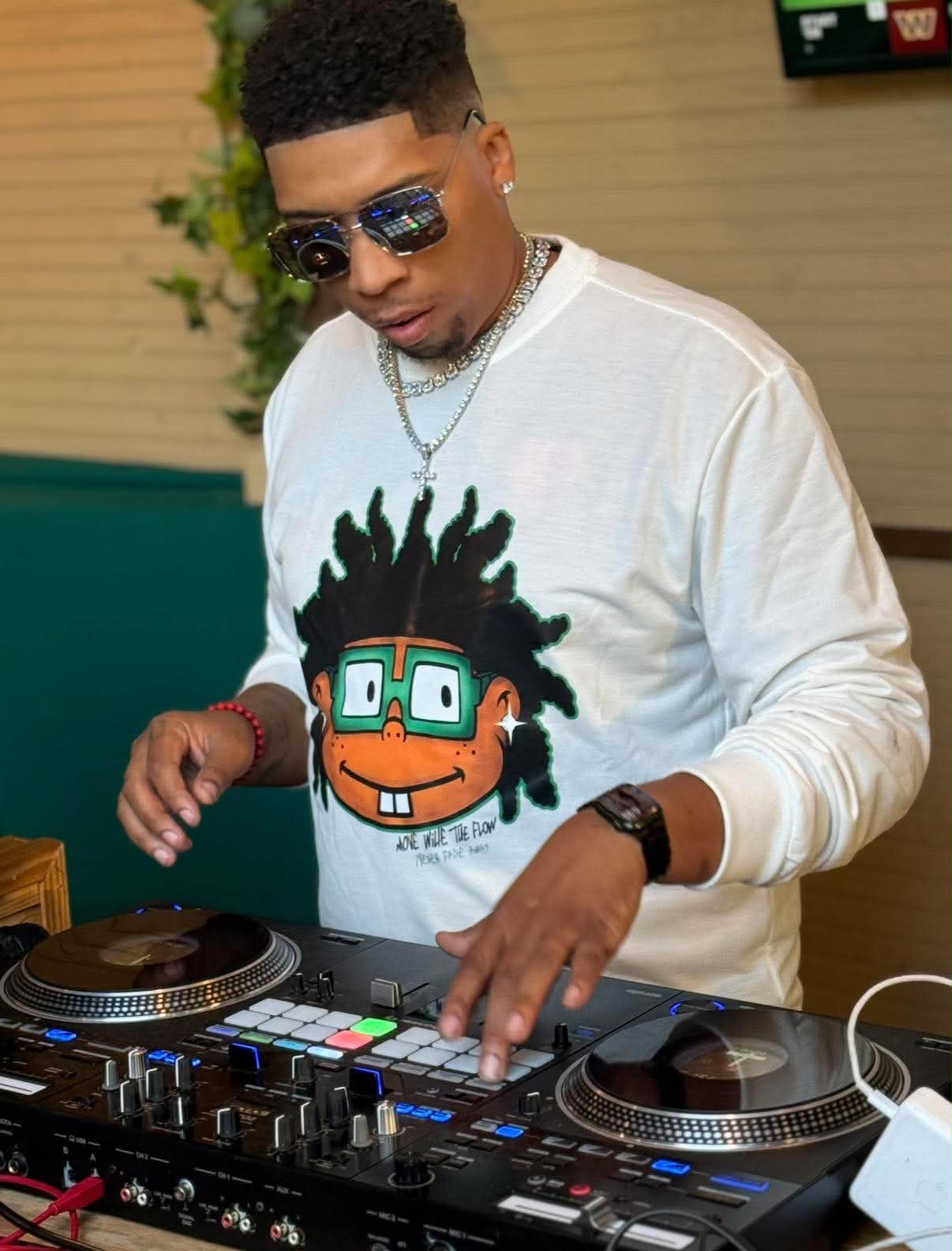 DJ Endy on Pioneer decks in a Rugrats long-sleeve
