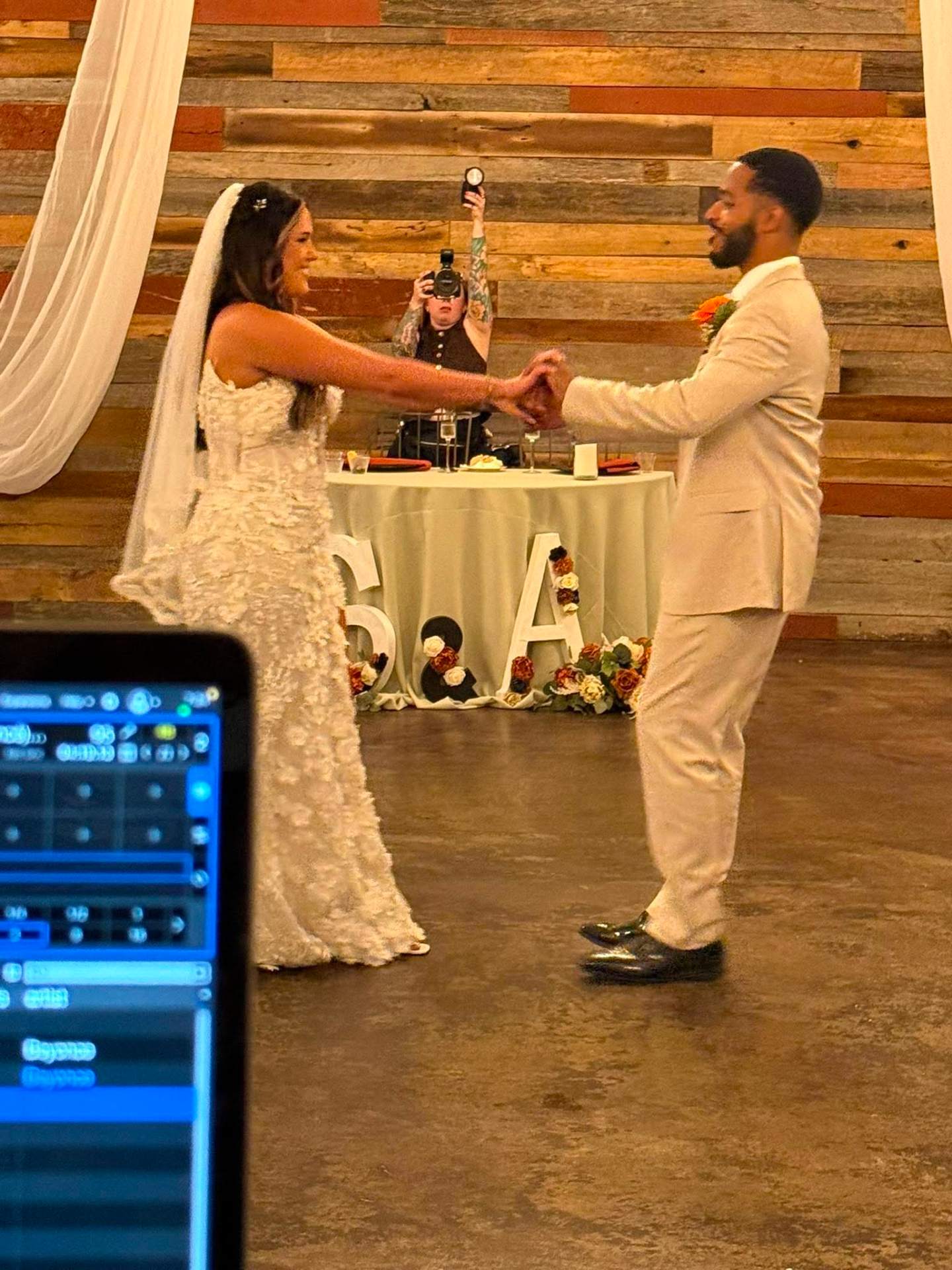Bride and groom first dance with DJ Endy in the booth