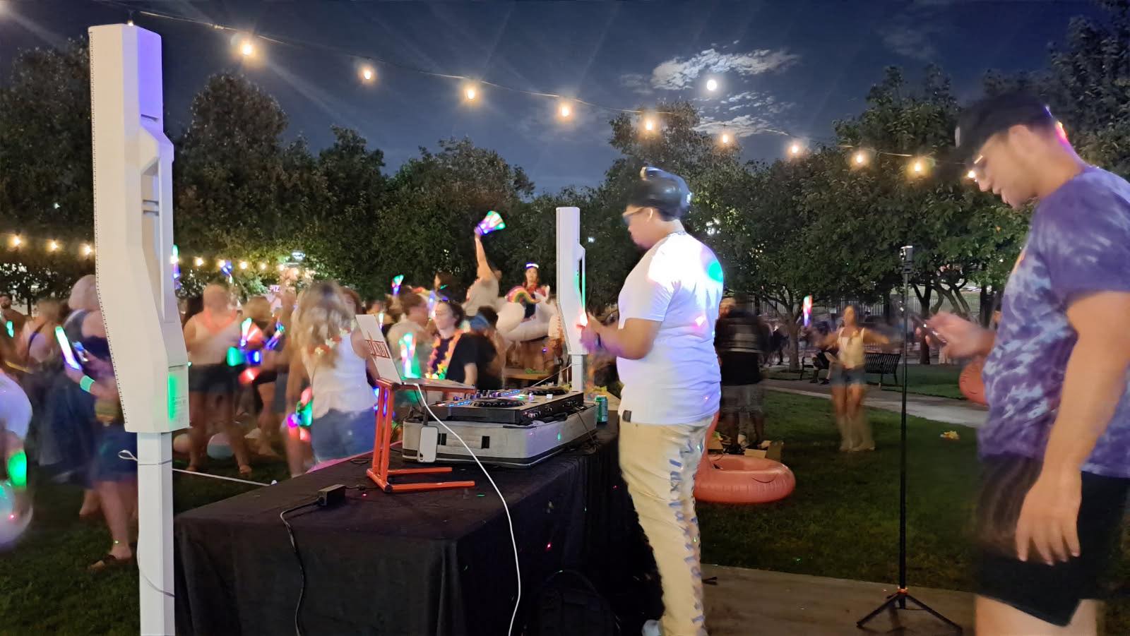 DJ Endy on the decks at an outdoor park party